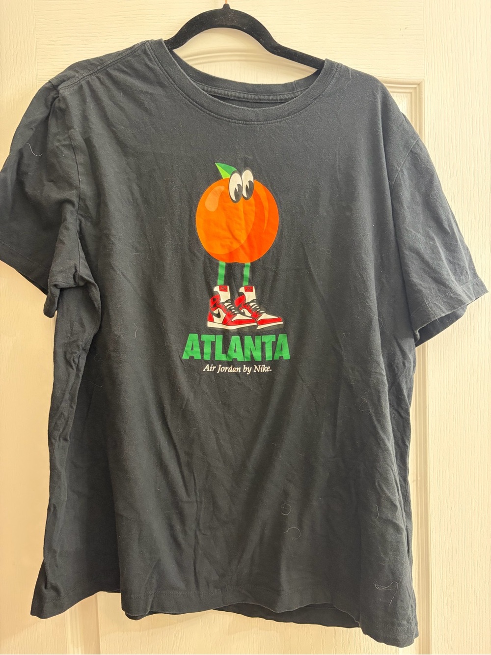 Atlanta Jordan Orange Graphic Tee - Black